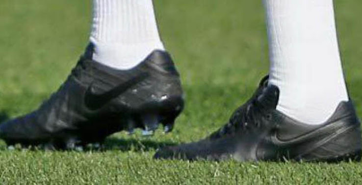 Blacked out nike tiempo shop